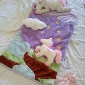 Child's sleeping bag with detachable unicorns and fairy